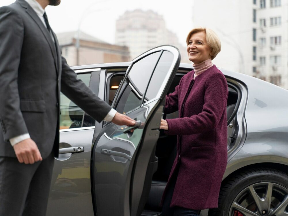 taxi-driver-female-client-interacting-formal-way_23-2149204532